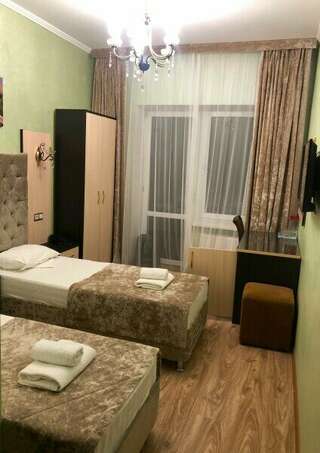 Гостиница Юнона Анапа Стандартный двухместный номер с 1 кроватью или 2 отдельными кроватями и балконом-6